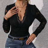 Front close-up view of black bodysuit with lace and long sleeves