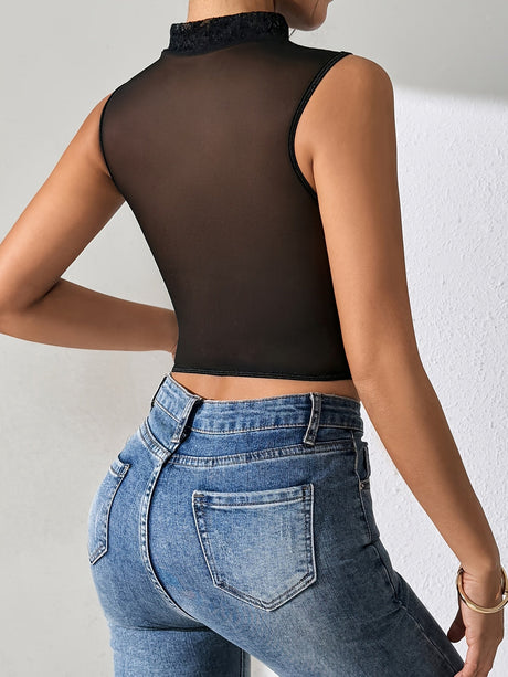 Rear view of black mesh corset top showing sleeveless design