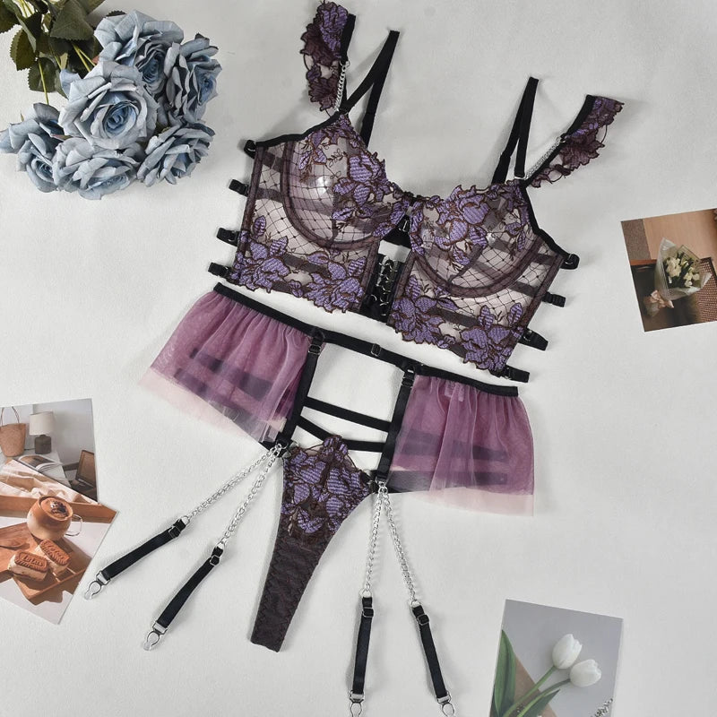 Flat lay of the Deep Purple Satin Lace Lingerie Set with garter straps and sheer mesh panels