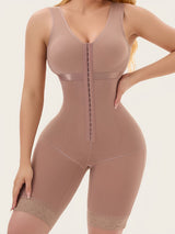 Woman in nude full bodysuit shapewear front view