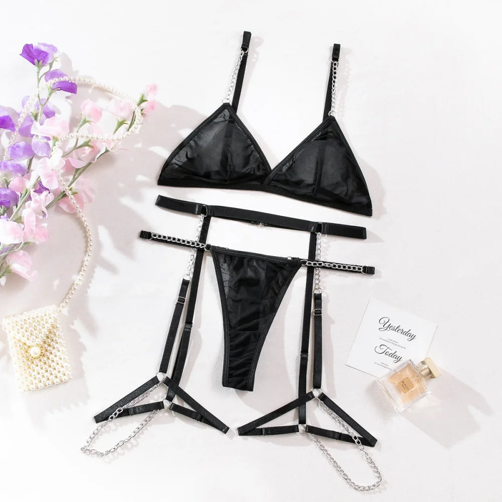 Skimpy black lingerie set front view with sheer mesh and metal rings